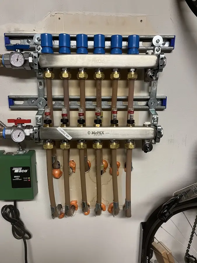 Plumber performing Gas Line Installation at a residential property in Florence